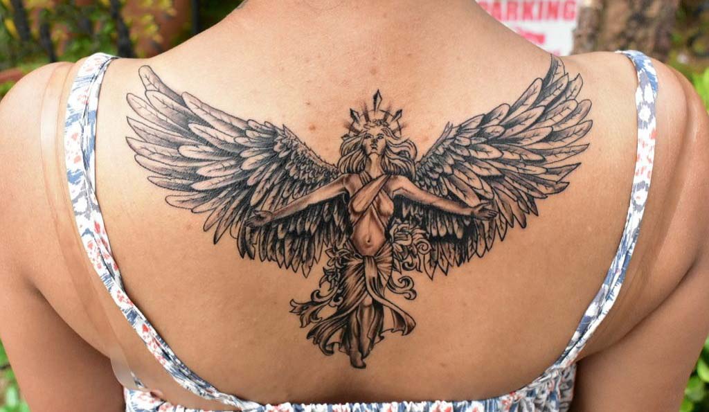 flying baby angel tattoo